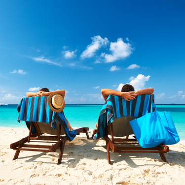 Honeymoon_Couple_Relaxing_Beach-1.jpg